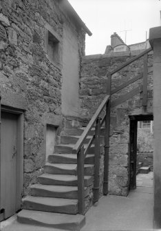 View of stone staircase in courtyard, Black Castle, South Queensferry.