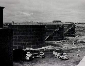 Image from photo album titled 'Braehead Oil Conversion', Oil storage tanks from coal store