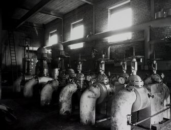 Image from photo album titled 'Braehead Oil Conversion', Transfer pumps and strainers package boiler house (1 pump removed)