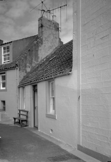 View of street front of 5 West Shore, Pittenweem, from east.