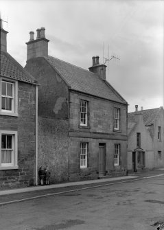 General view of frontage of 46-48 High Street, Pittenweem, from north east.