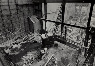 Image from untitled photo album, Turbine House. Sheet piles being driven prior to underpinning of North Turbine House columns.