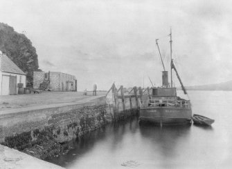 General view of harbour with ship, Port Askaig. 