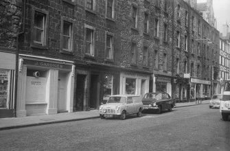 General view of ground floor shop fronts, Bristo Street, Edinburgh.