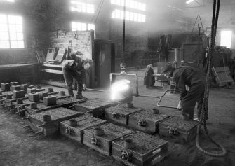 Bridge of Allan, Cornton Foundry
Interior, View showing men pouring iron into mould