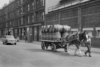 Glasgow, Stobcross Street.
View from WNW showing horse lorry travelling along Stobcross Street with tenements and works in background.