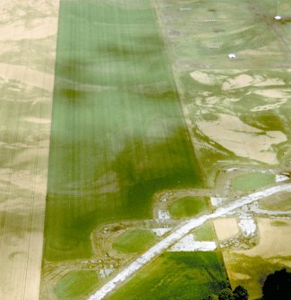 Aerial view of Brackla Ring ditch enclosures, near Cawdor, E of Inverness, looking NW.