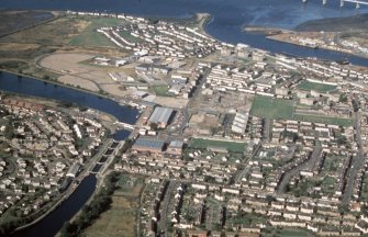 Aerial view of Muirtown Locks, Caledonian Canal and mouth of the River Ness, Inverness, looking N.
