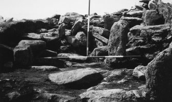 Excavation photograph - Norse level constructed on collapsed debris of previous structural phases