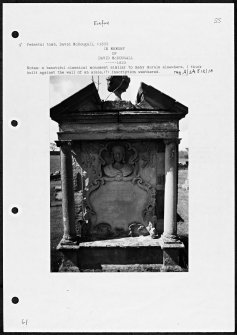 Photographs and research notes relating to graveyard monuments in Eckford Churchyard, Roxburghshire. 
