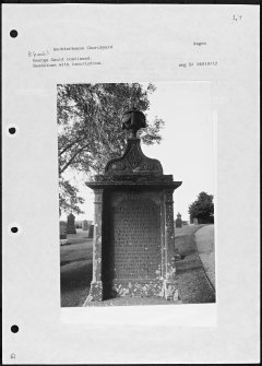 Photographs and research notes relating to graveyard monuments in Auchterhouse Churchyard, Angus. 
