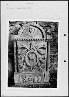 Photographs and research notes relating to graveyard monuments in Inverarity Churchyard, Angus. 
