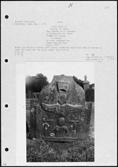 Photographs and research notes relating to graveyard monuments in Monikie Churchyard, Angus. 
