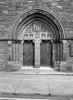 View from WNW showing doorway on WNW (William Street) front of St Michael and all Angels' Church, William Street, Helensburgh.	