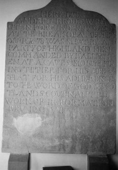 View of gravestone commemorating Andrew Brodie, 1678, in the churchyard of Forgandenny Parish Church.
Inscription on stone: 'Here Lyes Andrew Brodie Wright In Forgundenny Who At The Break Of A Meeting Ocbr 1678 Was Shot By A Party Of Highland Men Commanded By Ballechen At A Caves Mouth Flying Thither For His Life & That For His Adherence To The Word Of God & Scotlands Covenanted Work Of Reformation Rev.12C VII'.