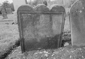 View of gravestone commemorating Charles Millar, 1753, in the churchyard of Forgandenny Parish Church.
The stone is inscribed: 'Here layeth the corps of Charles Millar who dies Dec 11 1750 aged 67 also the corps of Janet Wright his spouse who died Nor. 9 1729, her age 37'.