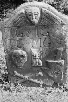 View of gravestone dated 1732 and inscribed 'IG TG IG MG' in the churchyard of Old Logie Church.