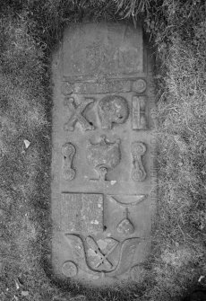 View of flat slab gravestone in the churchyard of Old Logie Church commemorating Margaret Glasone and inscribed 'IB MC'.