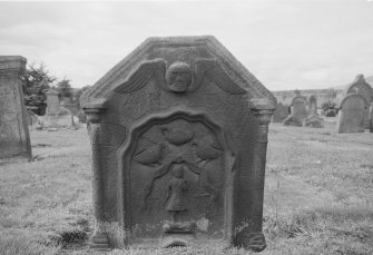 View of East face of gravestone commemorating mason with initials 'AH EC' 1731 in the churchyard of Kilsyth Parish Church.