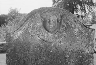 View of gravestone commemorating John Bremner, 1791, in the churchyard of Farnell Parish Church.