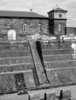 Glasgow, 18 Clydebrae Street, Govan Graving Docks.
Detail of North-East side and pumphouse with entrance to discharge culvert (left) on no.1 graving dock.