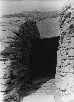 Passage between inner face of broch outer wall and south wheel shaped chamber.