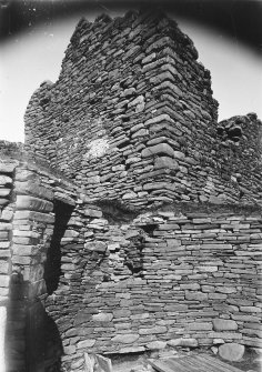 Interior of broch and exterior wall of Laird's House.