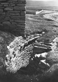 View showing house corner on wall of broch and cell of a chamber.
