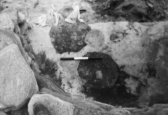 Excavation photographs: film card; quern stone in situ with wall F102; parallel walls in block 8 F102, F108 from above; F102 and quern stone from above; interior circular structure, first floor level, from W; pre-ex pit F230; interior circular structure from W; circular structure from above; F230 section; F230 post-ex; circular structure interior and post-ex F230; pre-ex F217 block 15 pit; circular structure interior, 2nd floor level, with 2 large pits; pre-ex of pits F151, 152, 253, 254; F218 pre-ex; post-ex F218; F253 section; quern stone.