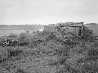 View of barn and horse-engine platform from W