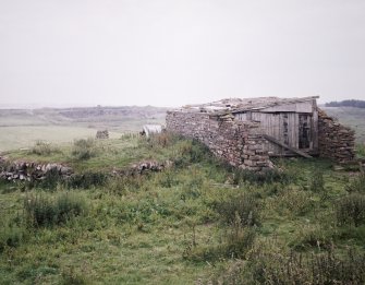 View of barn and horse-engine platform from W