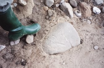 Detail of plough-scarred stone on SW side of cairn