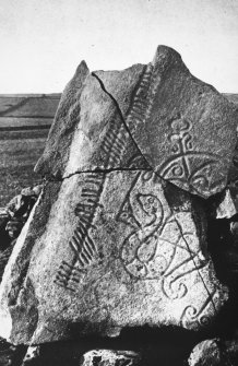 View of of the Brandsbutt symbol stone, Inverurie, showing the ogham inscription.