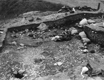 Cullykhan, view of excavation of prehistoric entrance showing gate-sill slot from E (inside) and postholes of the entrance.