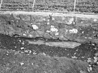 The upper surface of the orthostat in the south wall of the churchyard from the north