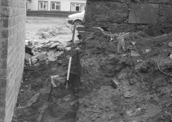 Excavation photograph : looking south along section.