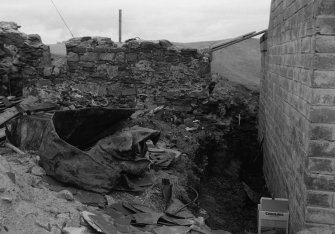 Excavation photograph : section in relation to section looking north.