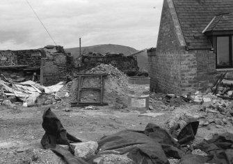 Excavation photograph : section in relation to section looking north.