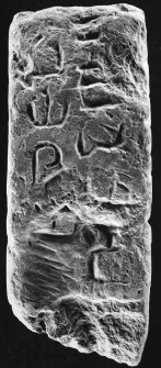 Inscribed stone, face 'b'.