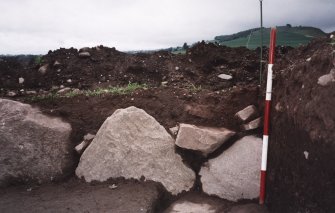 View of the NW corner of the excavation trench. Scale in 200mm divisions