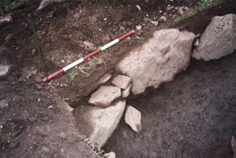 View of the SW corner of the excavation trench. Scale in 200mm divisions