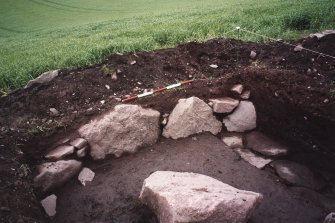 View of the NW corner of the excavation trench. Scale in 200mm divisions