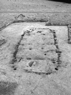 Site under excavation. Hi-spy view from SW with ranging poles.