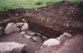 View from SE of N end of excavation trench. Scale in 200mm divisions 