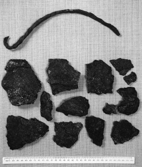 Handle and fragments of iron Cauldron (NMA No 1L 135, 1L  136) RCAHMS 1982