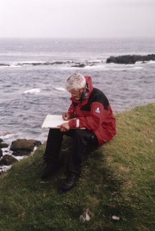 Muck, Caisteal an Duin Bhain. Fort. Site survey in progess. Ian Parker with the drawing board.
