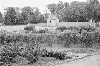 General view of stable block and dovecot, Old Home Farm, Fyvie Castle, from South.
