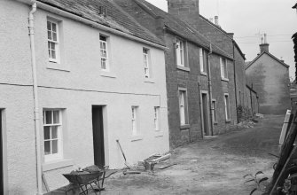 View of 9, 11 and 13 Brechin Road, The Tenements, Kirriemuir, from SW.