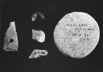 Keil Cave, stone disc, flints, bone and glass bead.