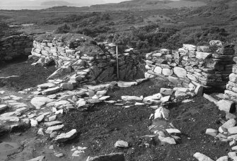 Excavation photograph : western half of fort, period I - staff marks end of gallery.